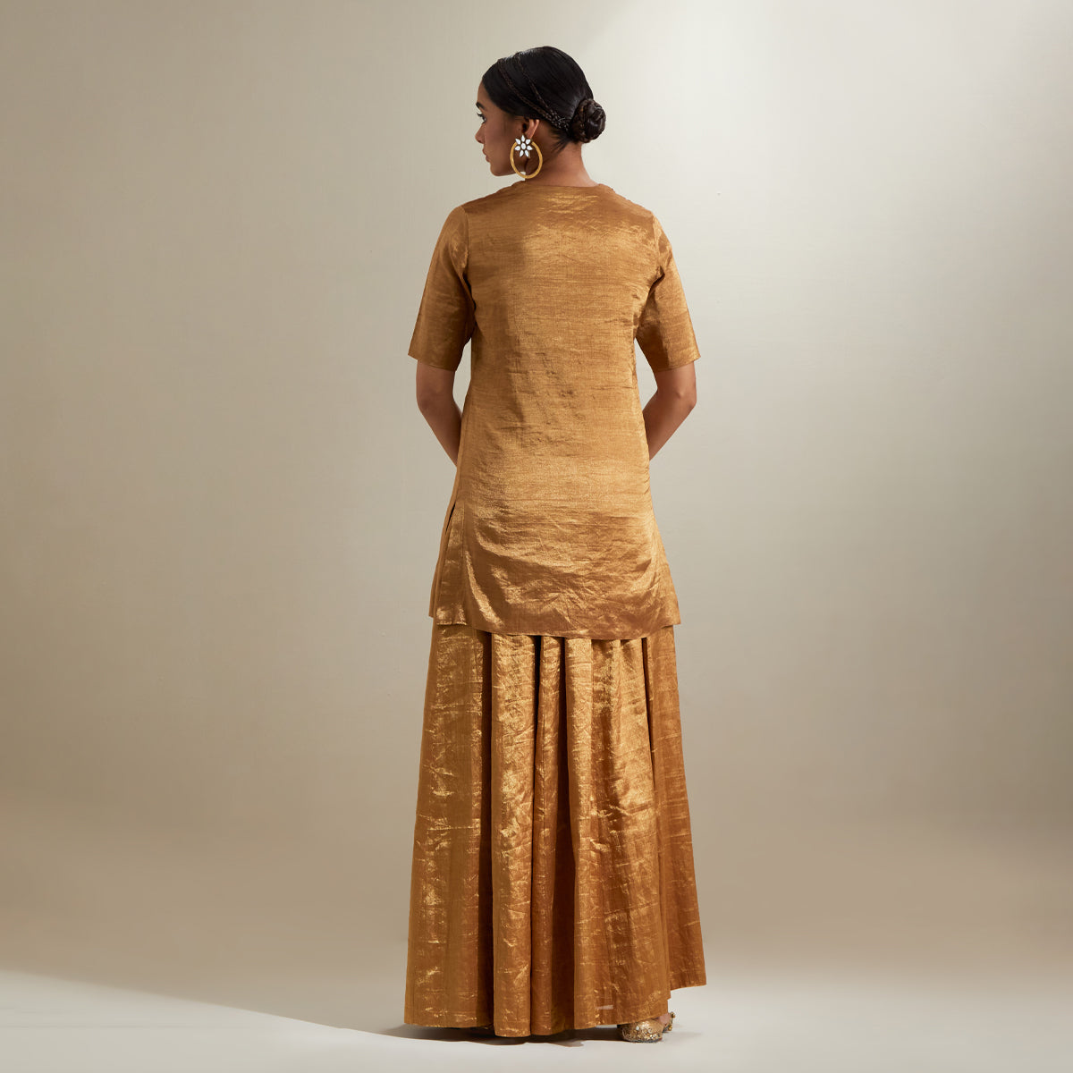 Gold Zari Short kurta and Sharara, with Hot Pink Embroidered Dupatta