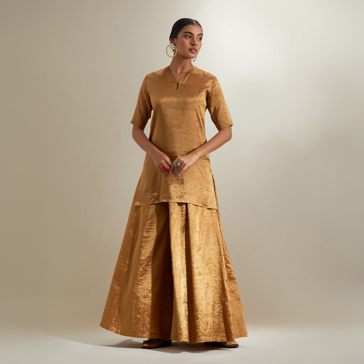 Gold Zari Short kurta and Sharara, with Hot Pink Embroidered Dupatta