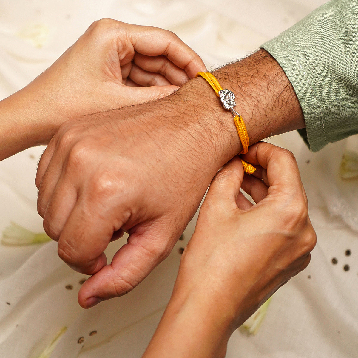 Dew Rakhi - Silver & Yellow
