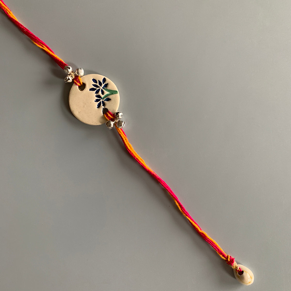 Handmade Ceramic Rakhi | Cotton Threads-White, Red, Yellow