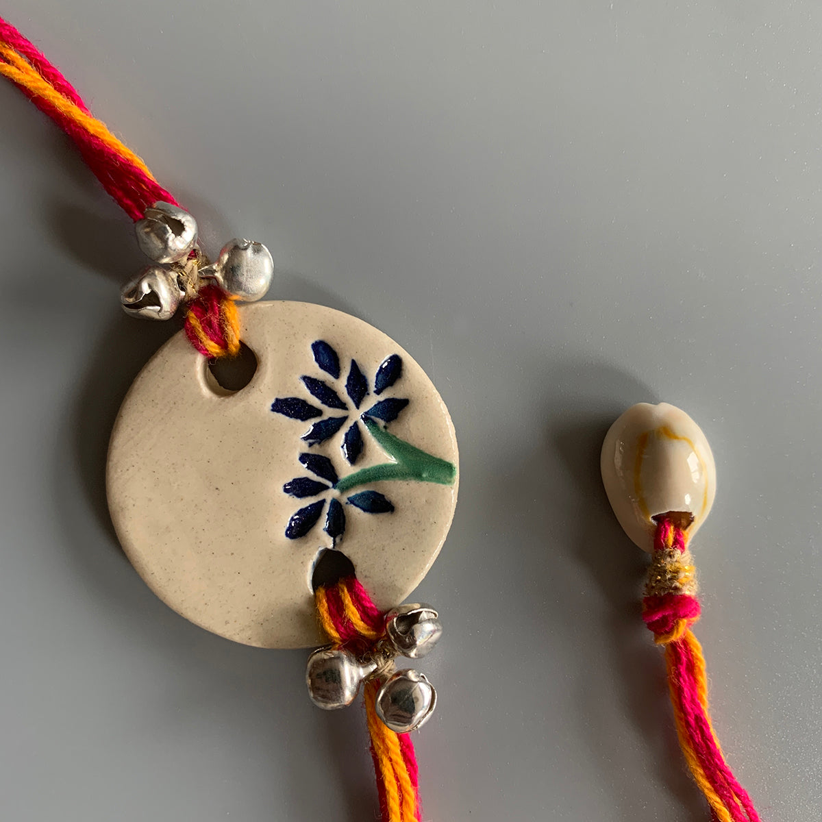 Handmade Ceramic Rakhi | Cotton Threads-White, Red, Yellow