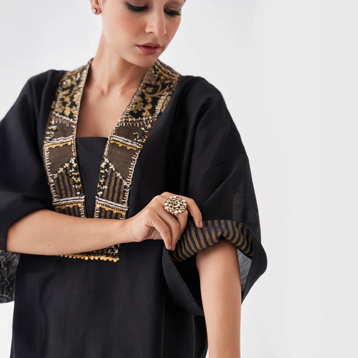 The Surmayee Silk Chanderi Ensemble with Woven Banarasi & Handwork